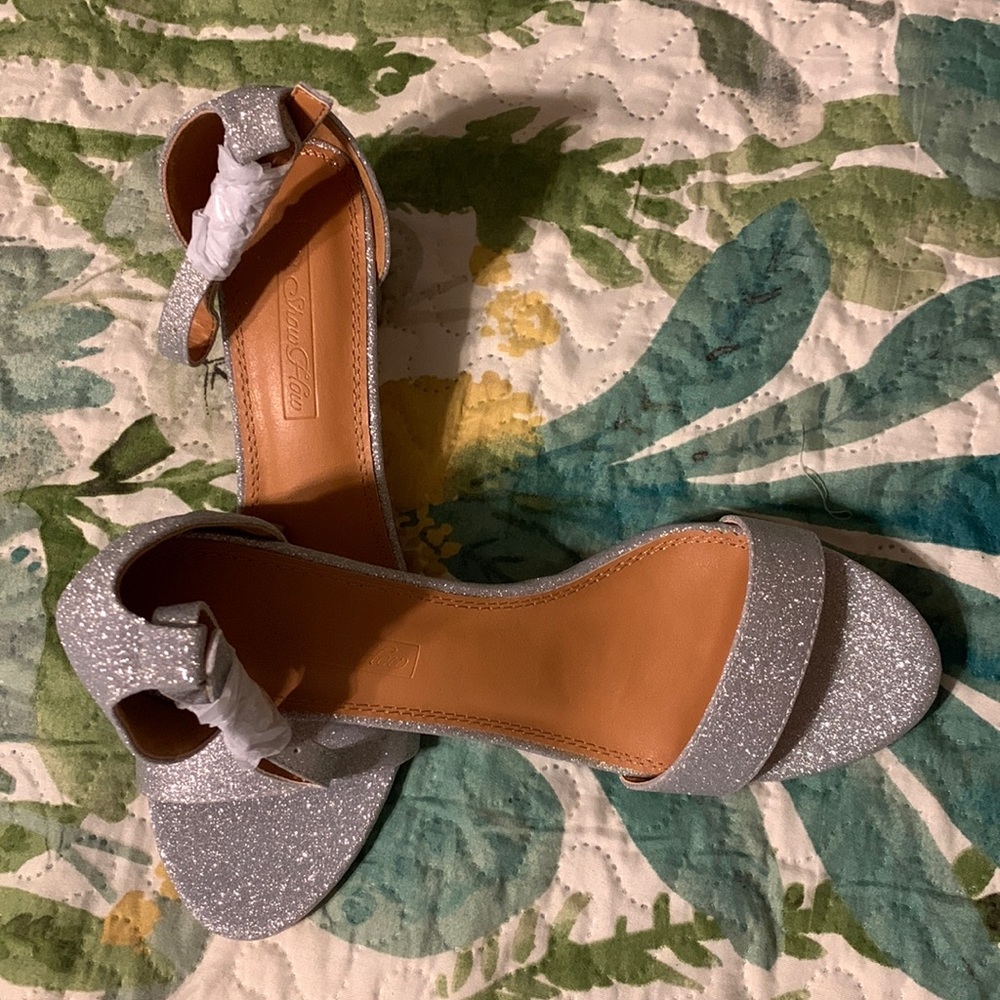 Show How silver glitter, chunky heeled,dress sandals.